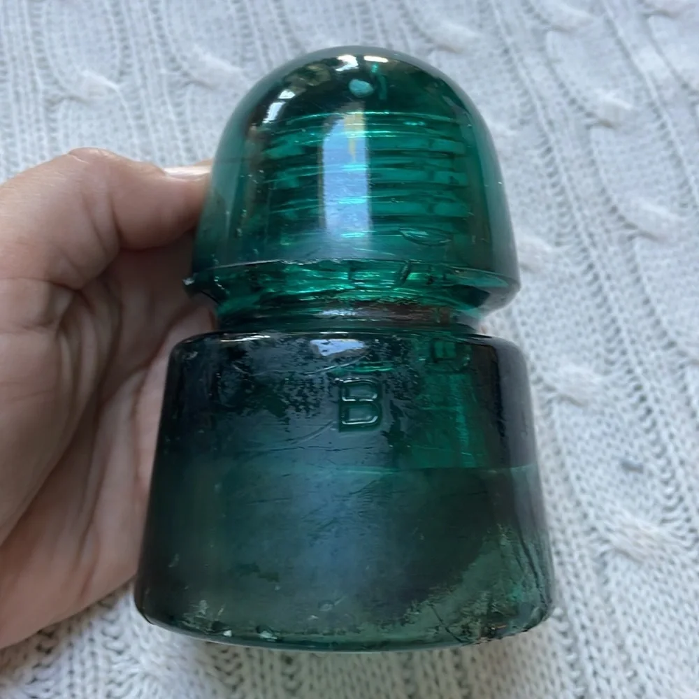 Antique glass insulator. Aqua teal glass. Threads inside stamped B on outside